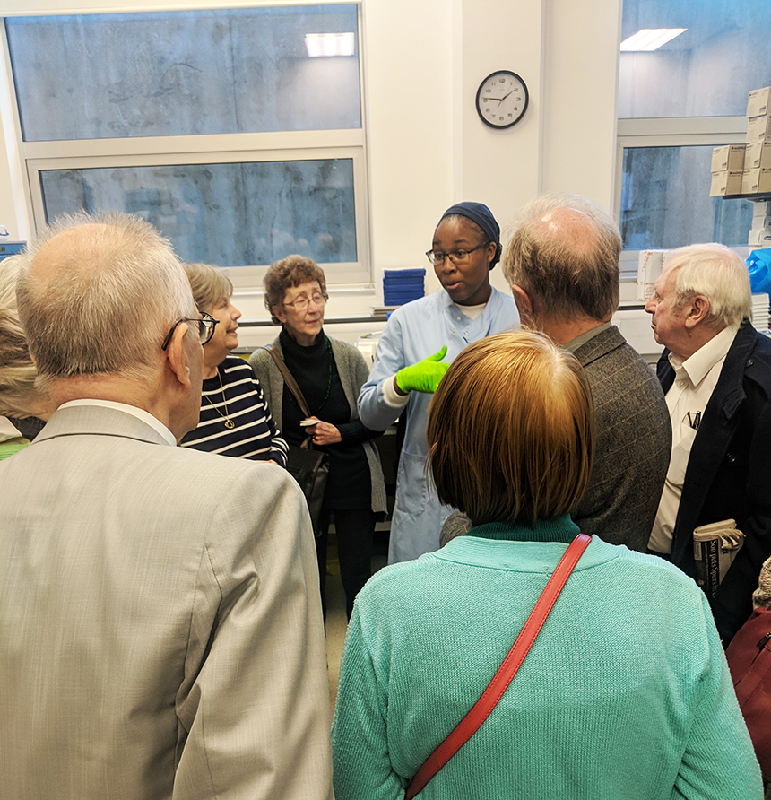 Shalmai speaks to study partners visiting the brain bank