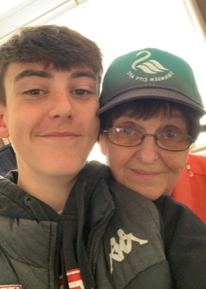 Joanna's son, McKenzie, with his grandma Sue at a Swansea City match