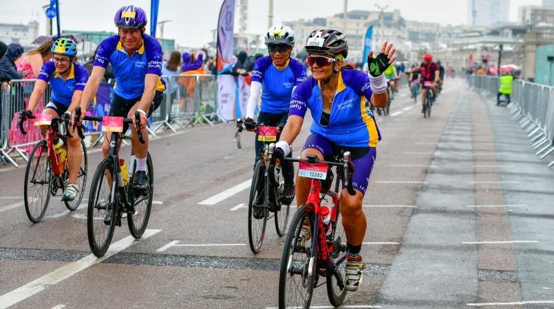 Group of cyclists finishing the London to Brighton Cycle