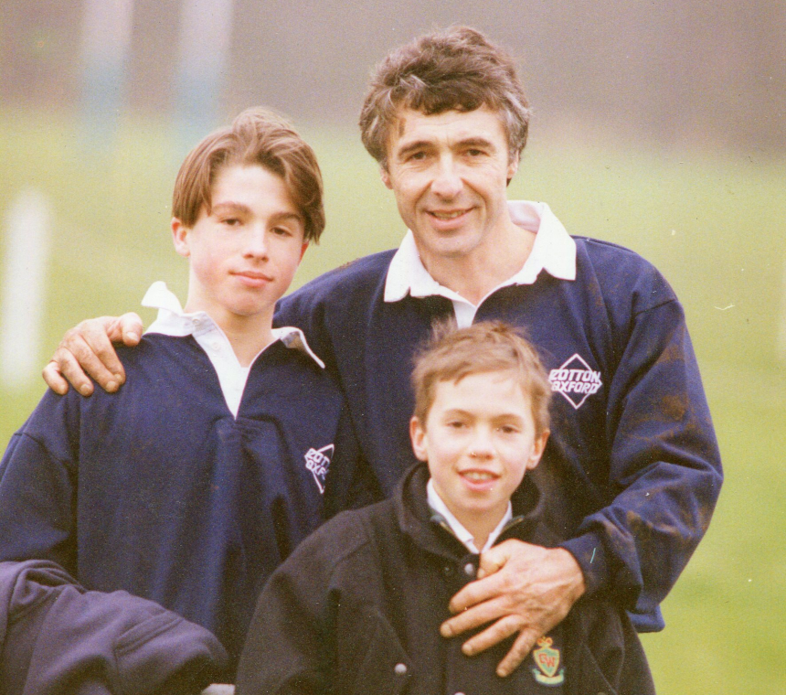 Charlie pictured as a boy with his father and late brother