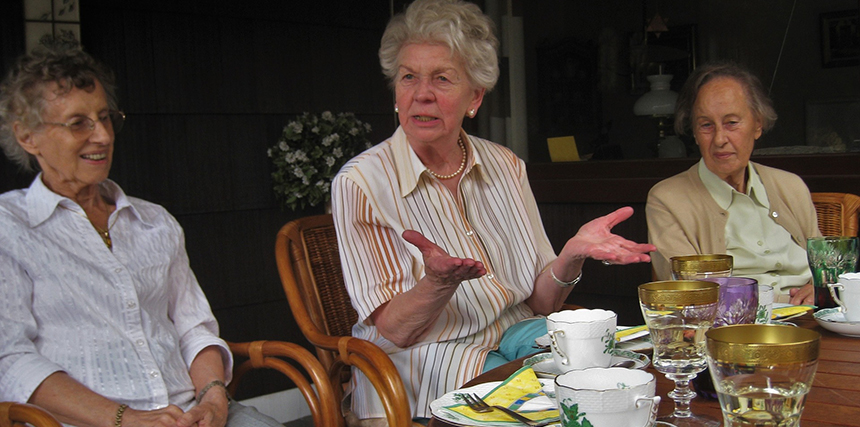Three older women at a tea party