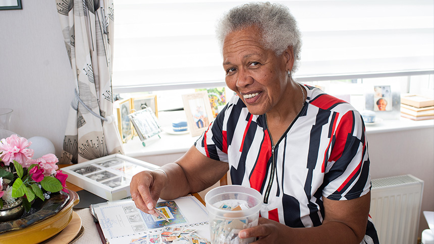 Coral with some of her stamp collection