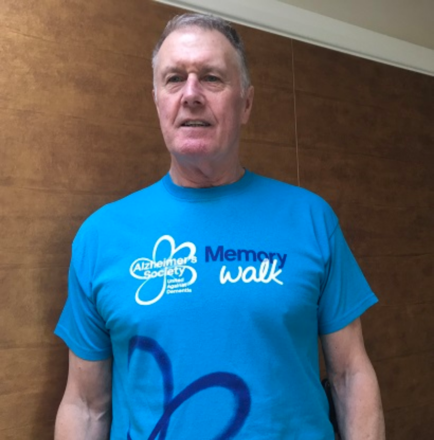 Geoff Hurst wearing a 'memory walk' shirt