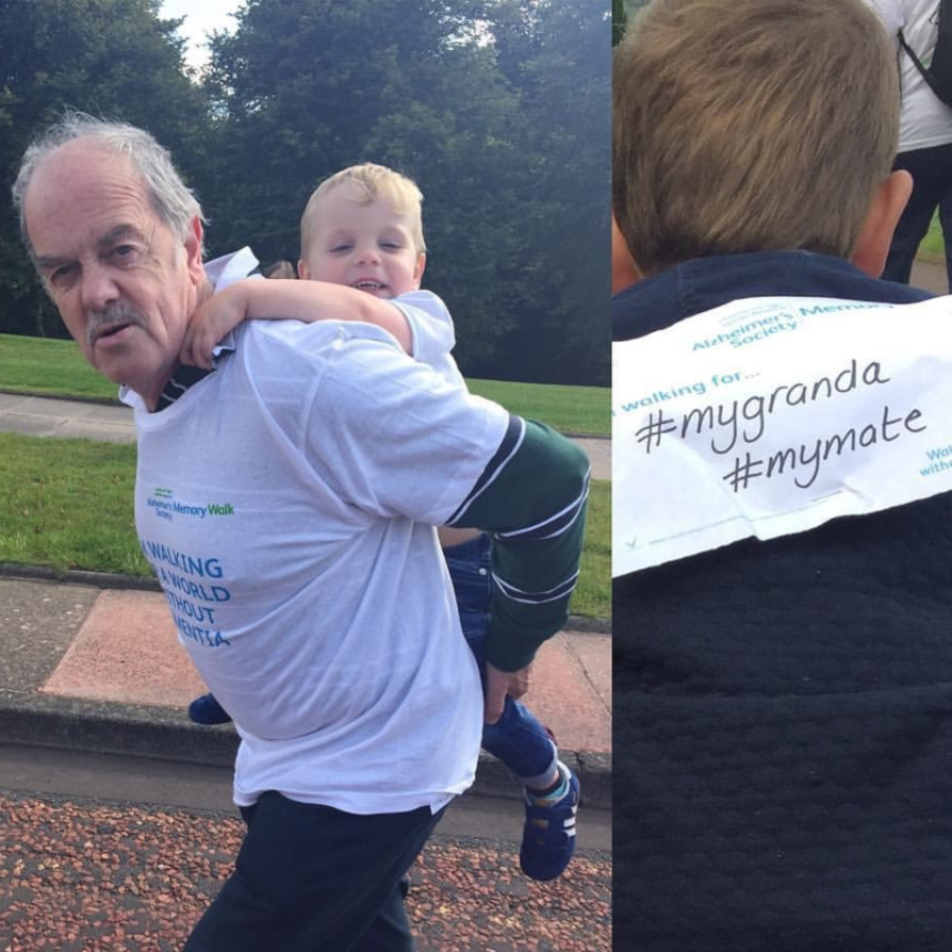 Jim at a previous Memory Walk with his grandson on his back