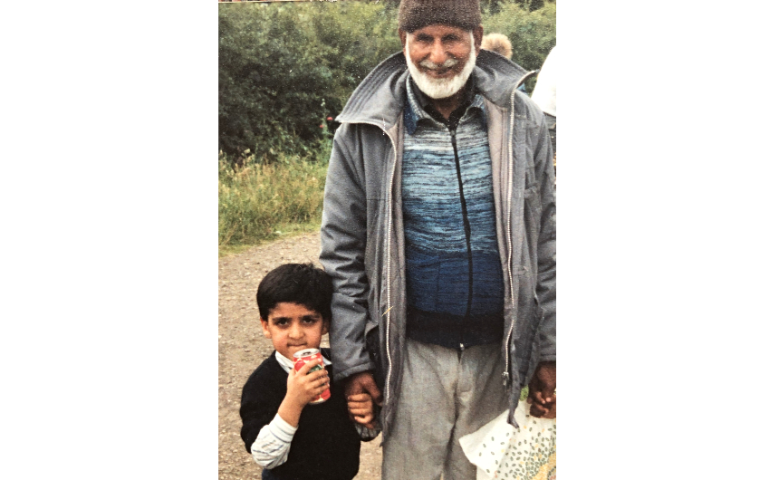 A young Khalid with his grandfather