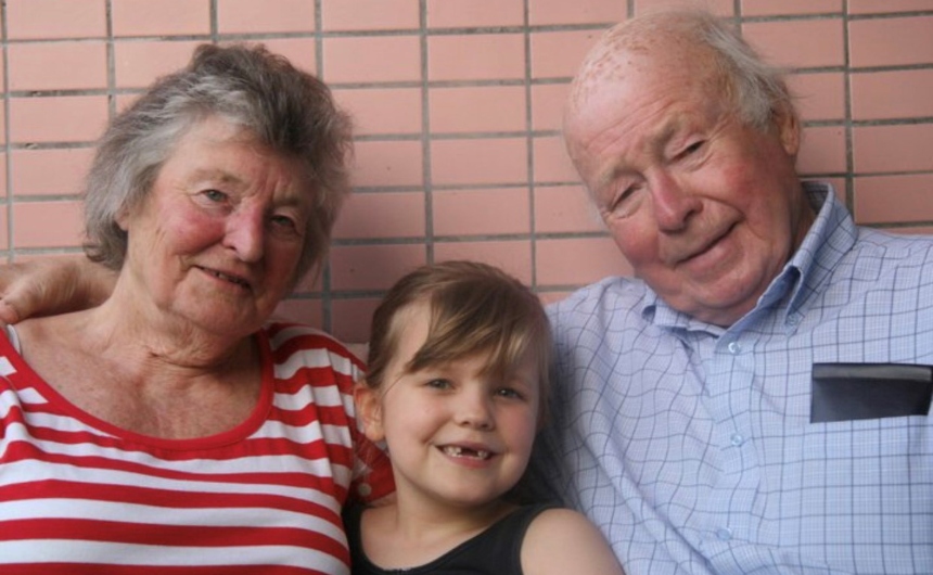 Mia with her grandparents