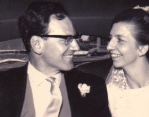 Susan and Ian Barlow on their wedding day, Susan looking into Ian's eyes and smiling