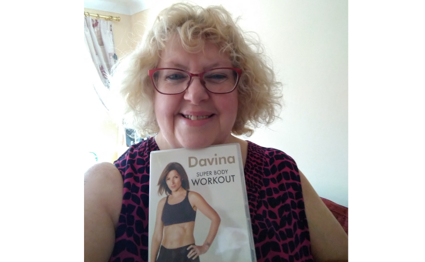 Tracey holding her Davina DVD