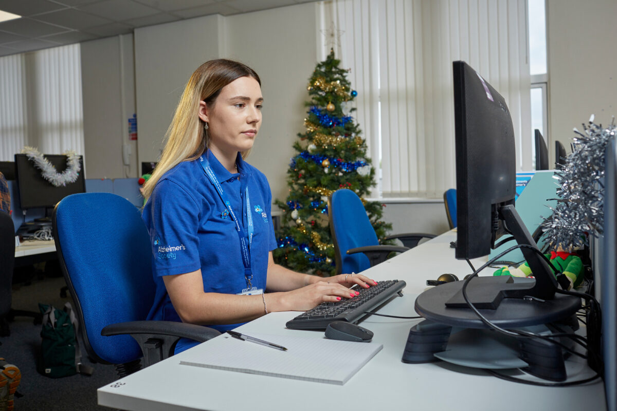 Grace at an Alzheimer's Society office on the support line