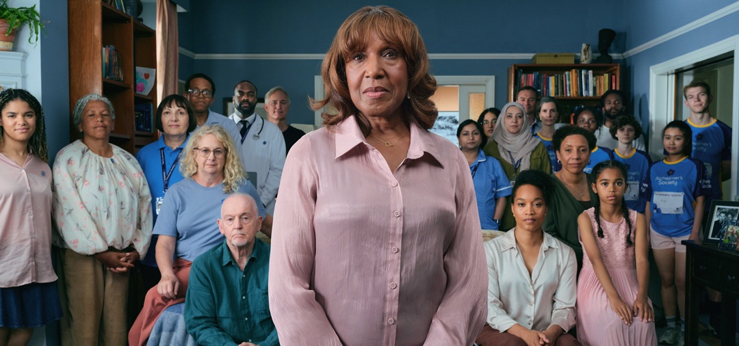 A diverse room of people representing different careers and backgrounds, including nurses, doctors and members of the public.