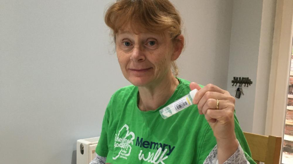 Sarah, a fundraiser for Alzheimer's Society, taking part in the saliva test study for coronavirus
