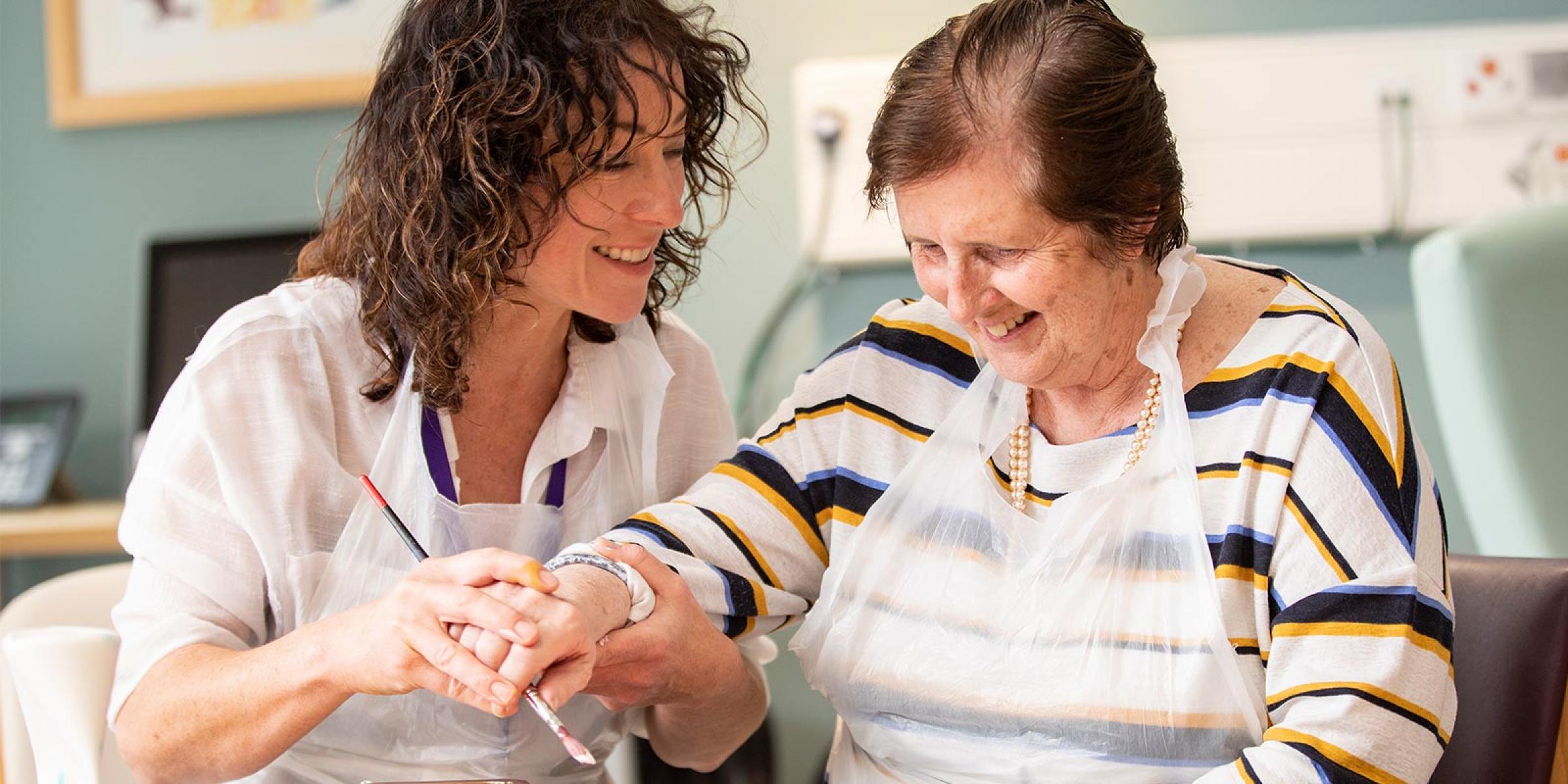 A painting session at NI Hospice's Dementia Wellbeing Clinic