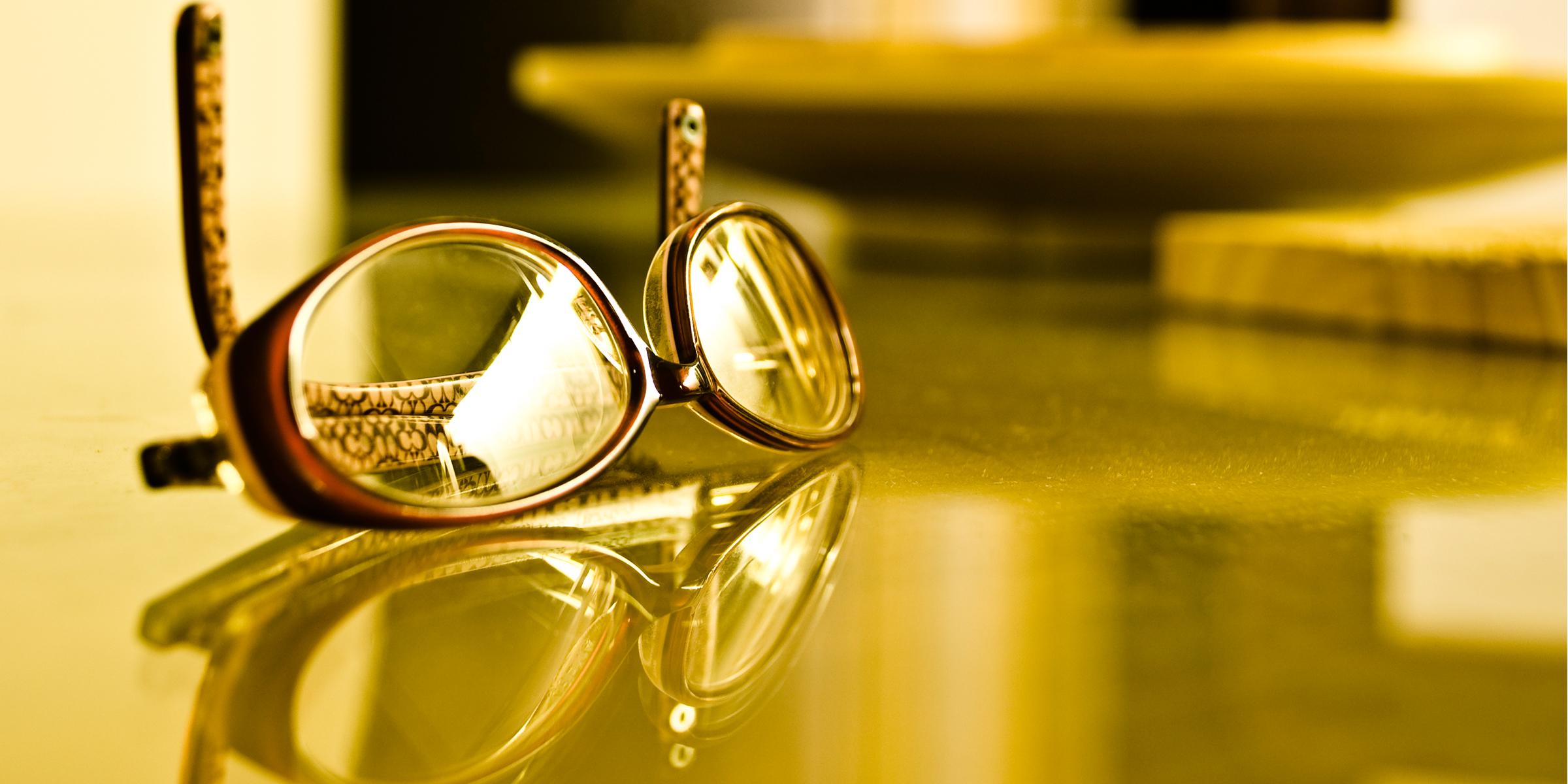Spectacles on a desk