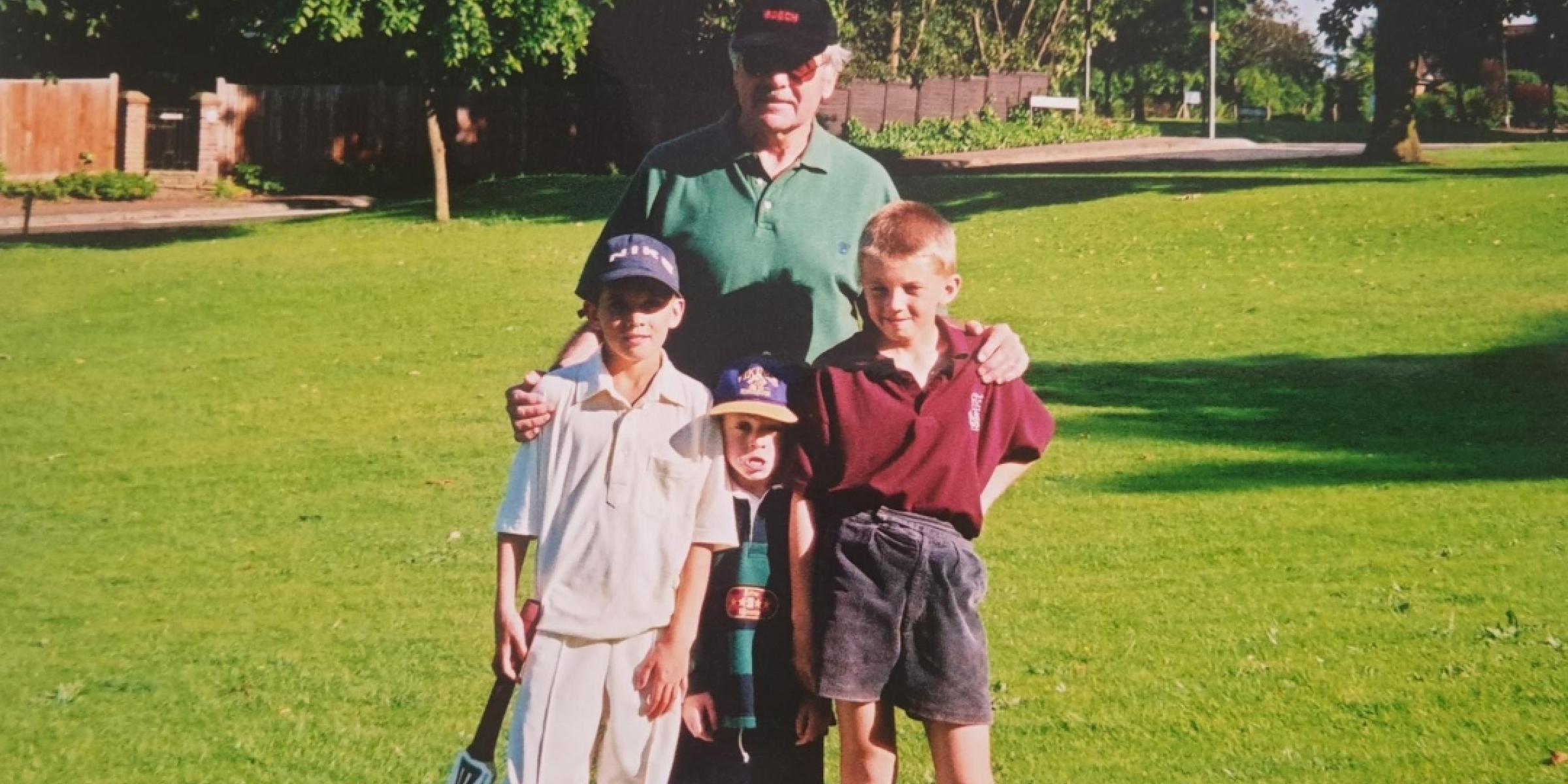 An old photograph of Stan with his three grandsons who are Kent cricket fans