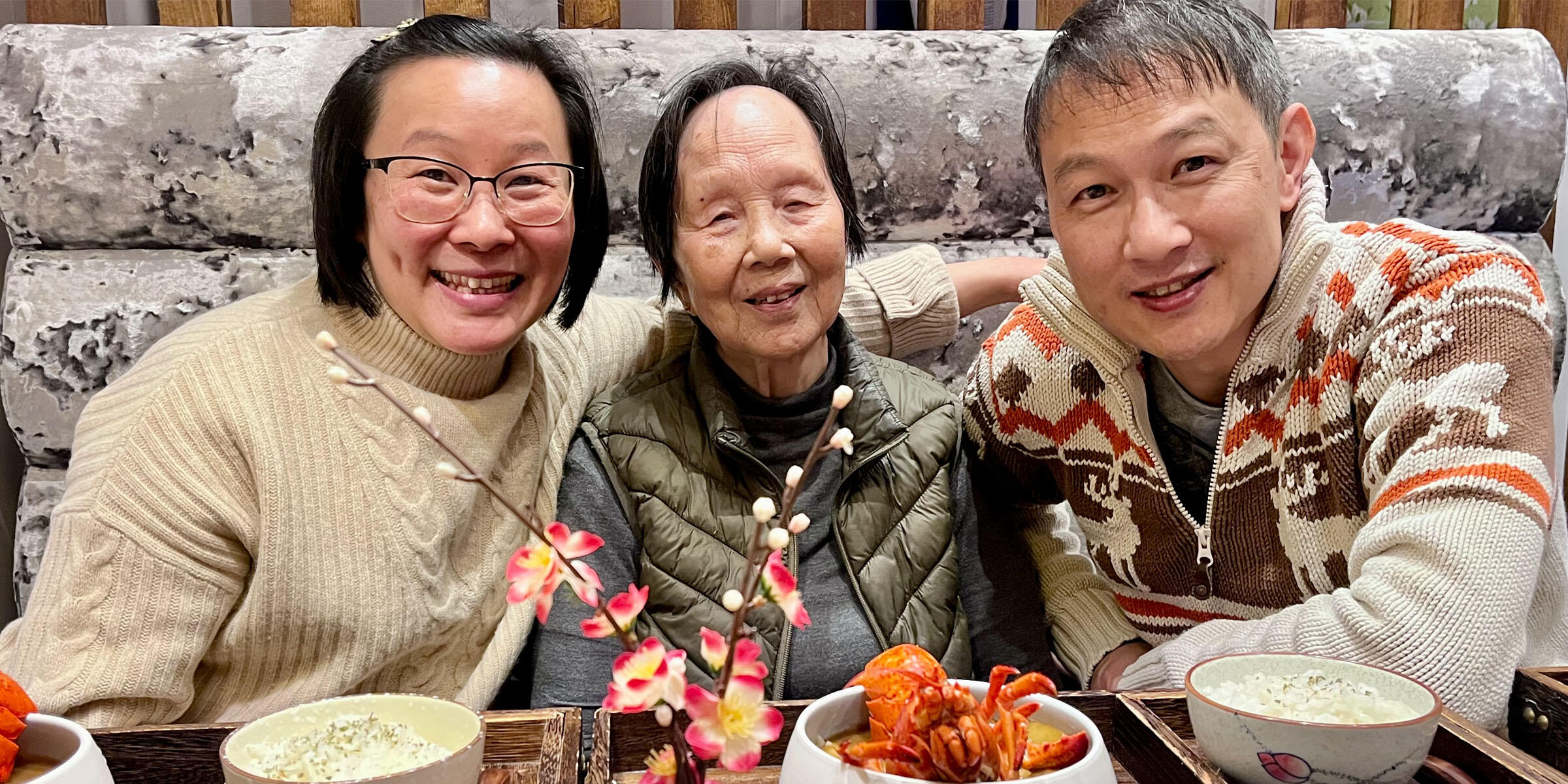 Steven Lai, his mother and a carer