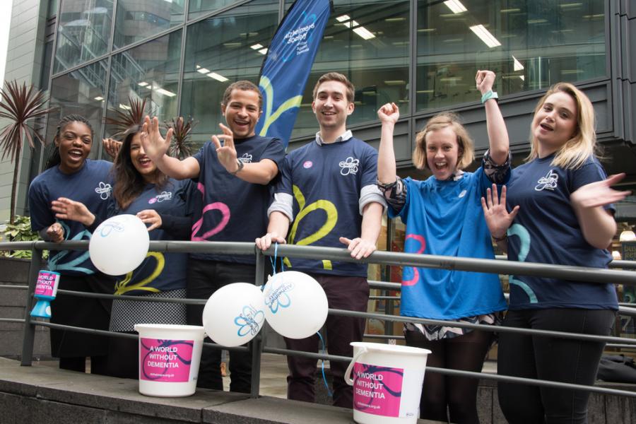 Alzheimer's Society's fundraising team cheering from the sidelines