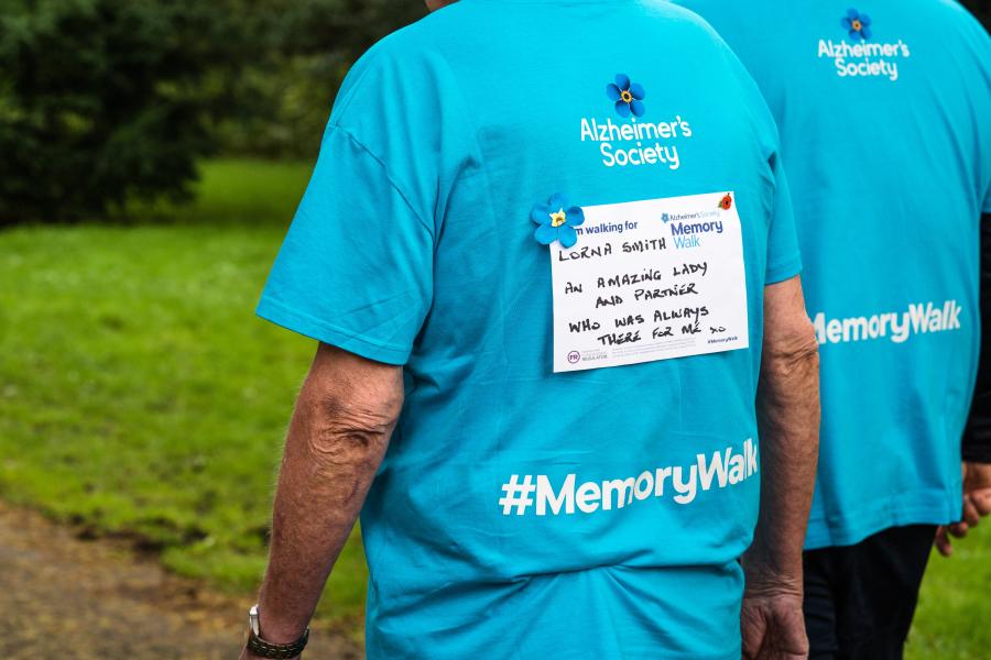 'In Memory' sign on the back of a t-shirt