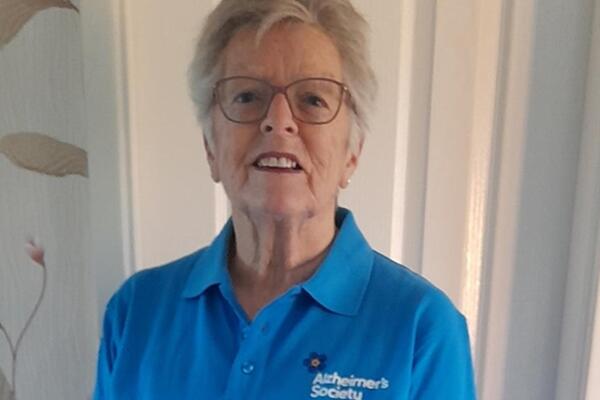 Heather Hooper Dementia Volunteer in a blue Alzheimer's Society t-shirt