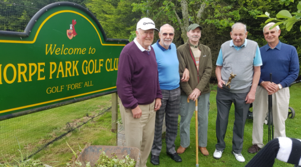 Golfers and volunteers at Lincoln Golf Centre
