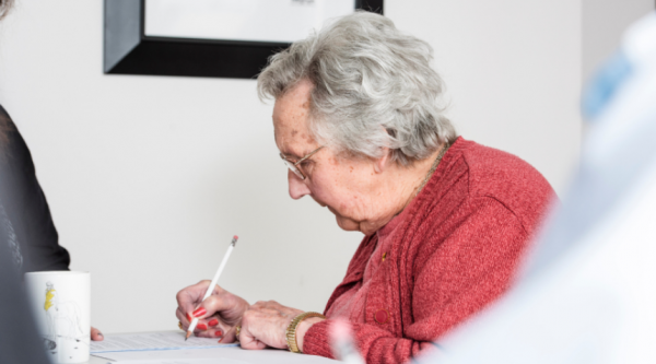 Lady filling out paperwork