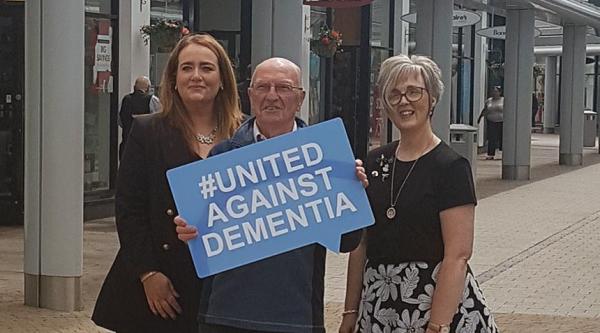 Lynne with Danny Brown, who has vascular dementia, and Leona Barr, manager of the Junction 