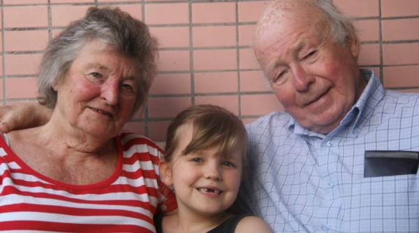 Mia with her grandparents