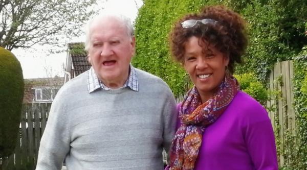 Janice in the garden with her dad, Rev. Arthur Parker