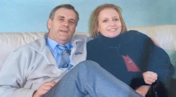 Peter and Joyce sitting on the sofa a number of years ago