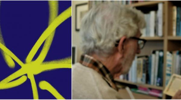 Tony Ward holding and reading a small poem