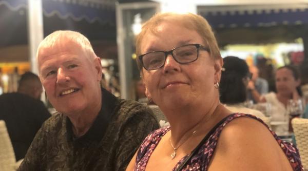 Jen's parents smiling together one evening