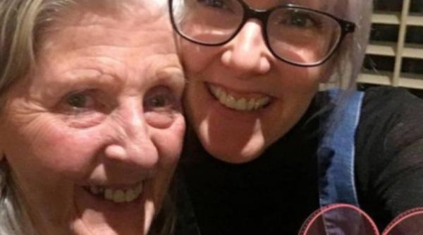 Martina and her mum smiling together in a selfie