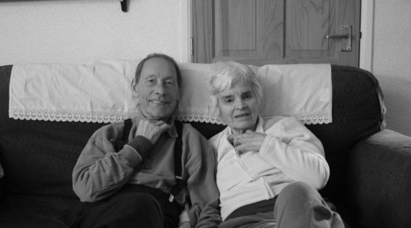 Kyra's grandparents, Aubrey and Winnifred, sat watching television together