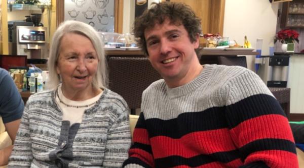 Stephen with his mum Sheila smiling at the care home