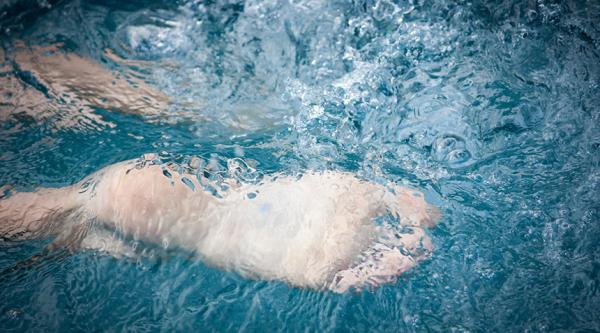 Someone's foot as they're swimming