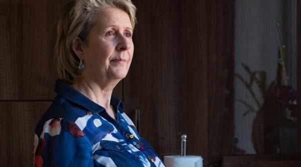 Person looking out of window