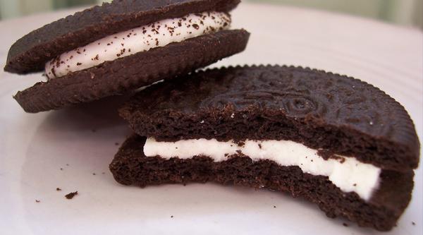 Half-eaten Oreo cookies on a plate