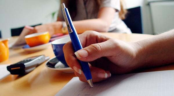 Writing during a meeting