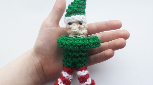Snuggle Elf toy in a hand