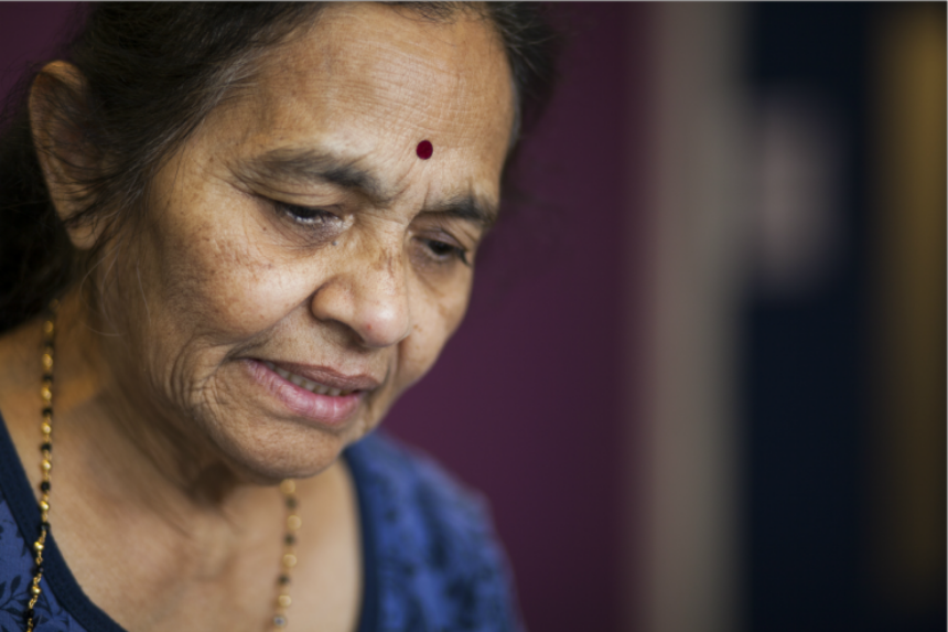 Elderly lady looking down