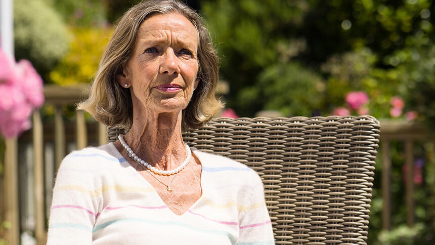 Liz Lane sitting outside