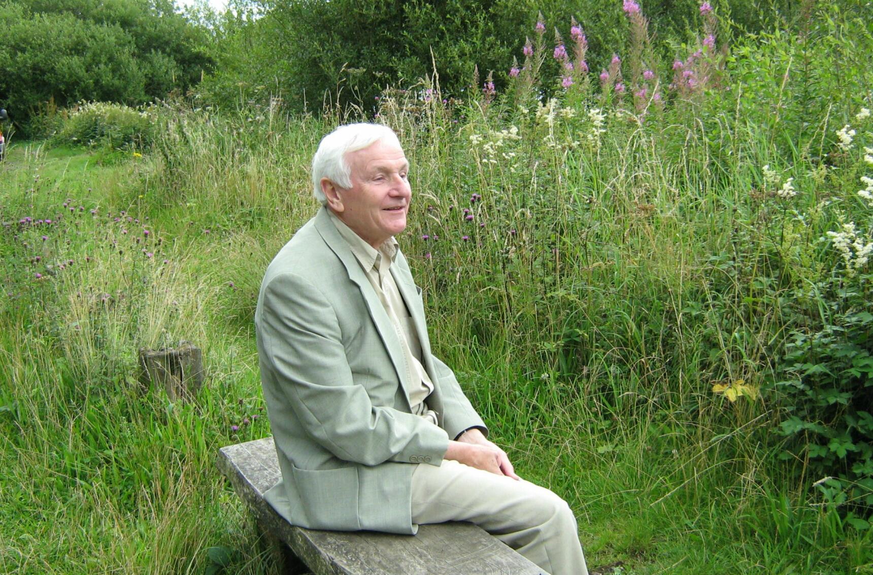 Sylvie's Grandad Owl sitting on a bench