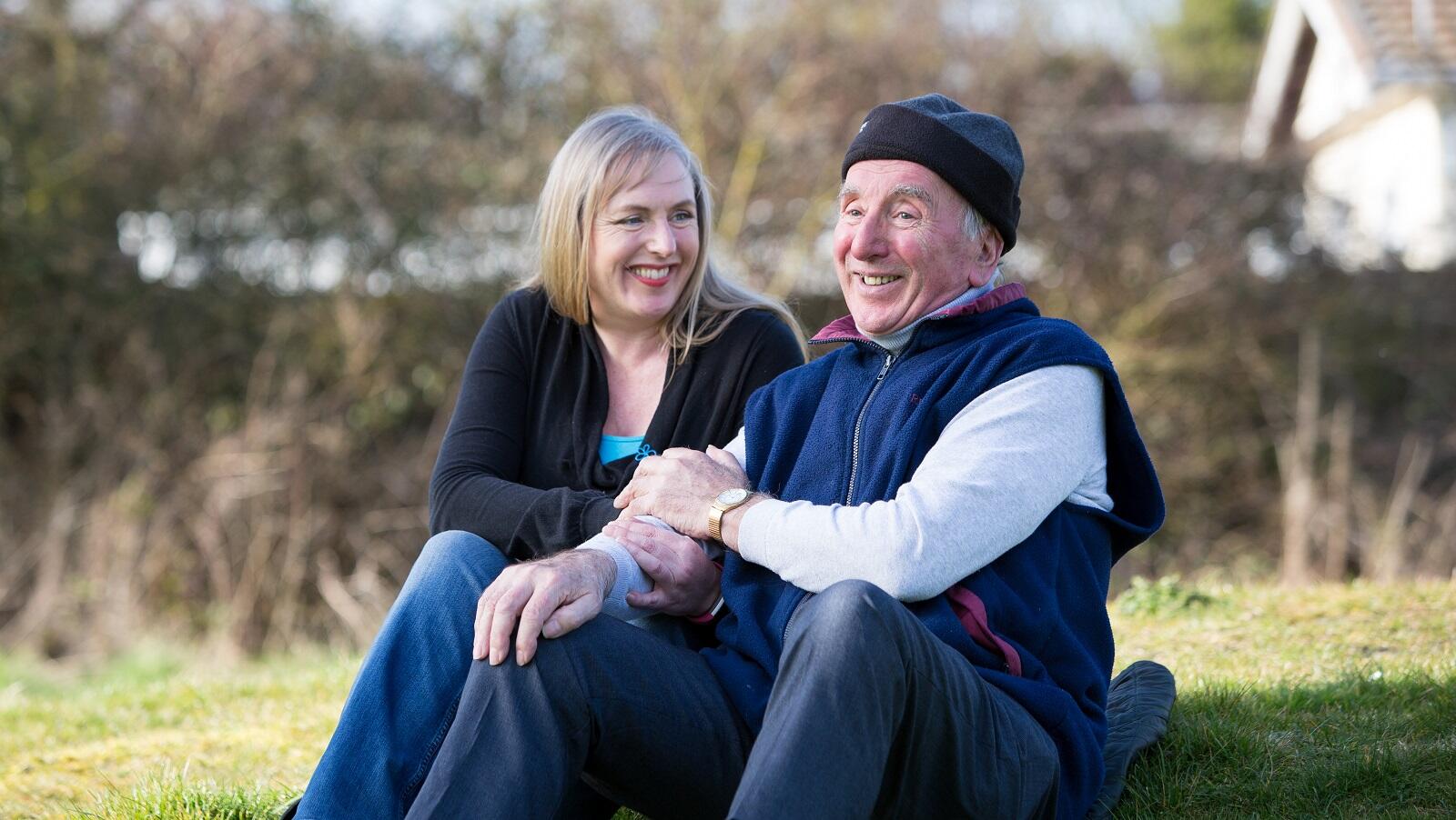 Couple sitting outside