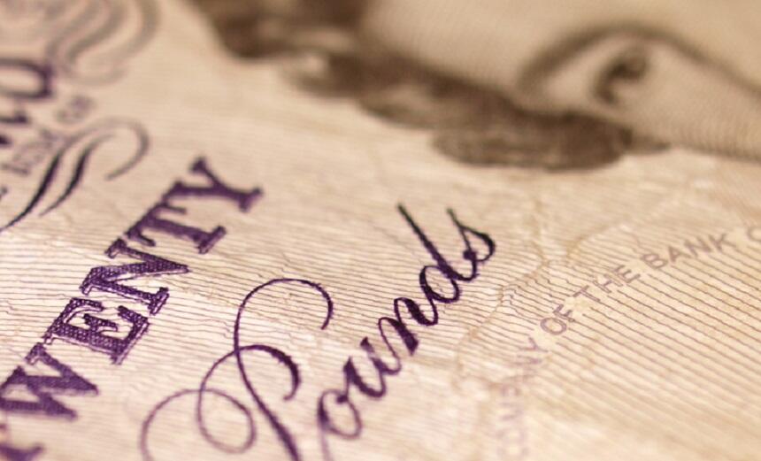A close up of a 20 pound note