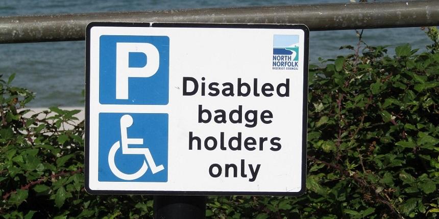 A blue badge parking sign