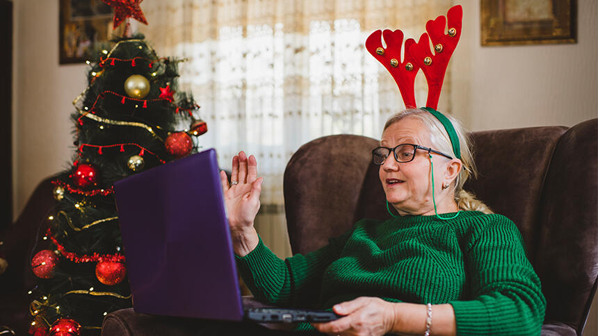 Wearing reindeer headgear while on a video call