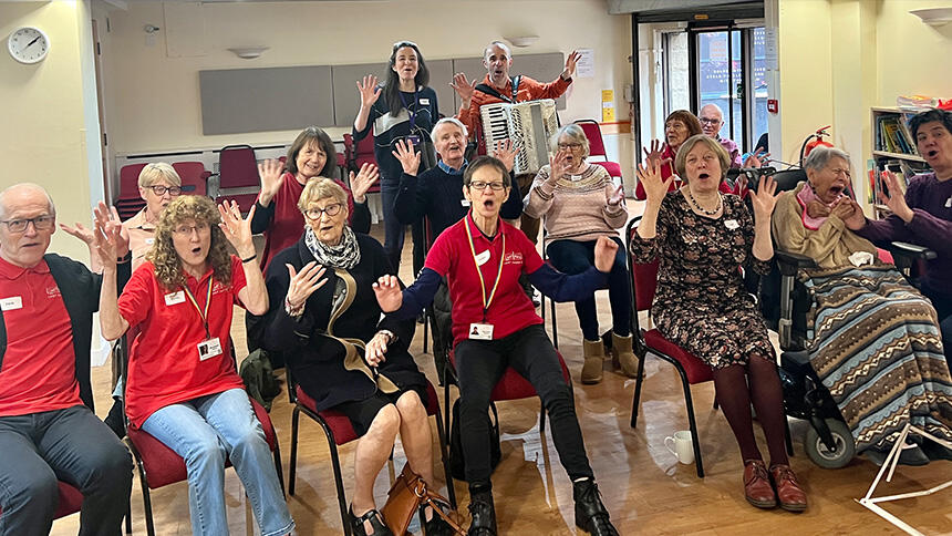 A group enjoys a Lost Chord session. They pose for a picture.