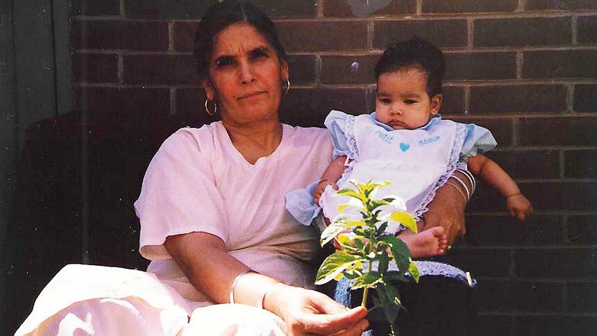 Nani Ji holding Kiran Kaur Barn as a baby