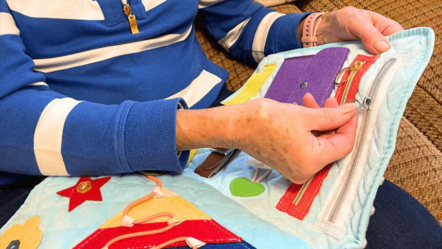 Person using a Fiddle book