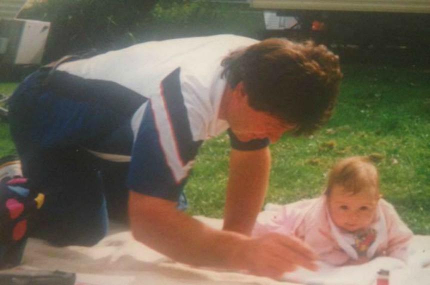 Alex as a baby with her dad, Dave