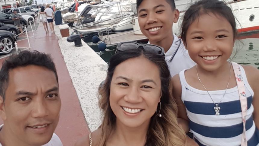Michelle Macadangdang with her family
